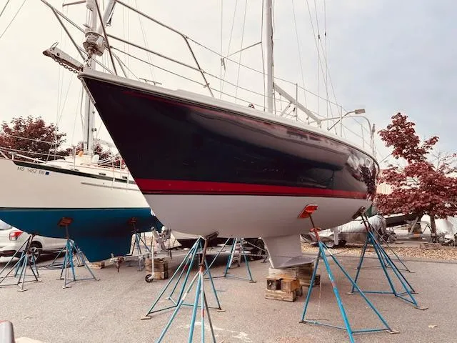 Slide: The Image of 2003 Catalina 36 MkII sailboat on stands, ready for maintenance or inspection. - 5