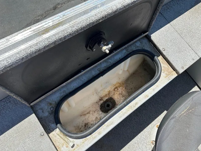 Slide: The Image of Open storage compartment in 2018 Alumacraft Yukon 165 boat. - 22