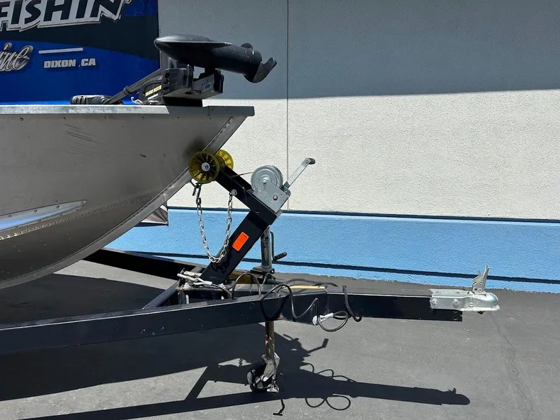 Slide: The Image of 2018 Alumacraft Yukon 165 boat trailer hitch and winch system. - 4
