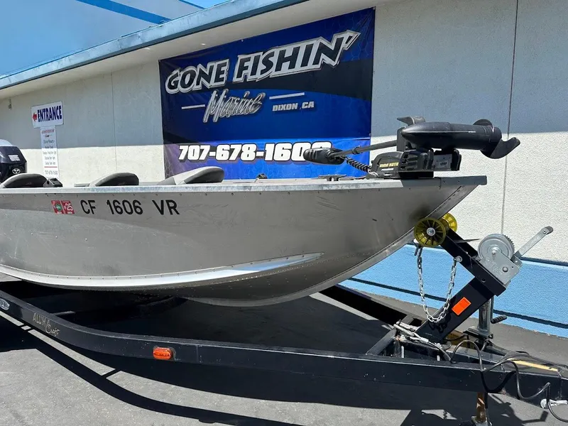 Slide: The Image of 2018 Alumacraft Yukon 165 boat on trailer at Gone Fishin' store. - 5