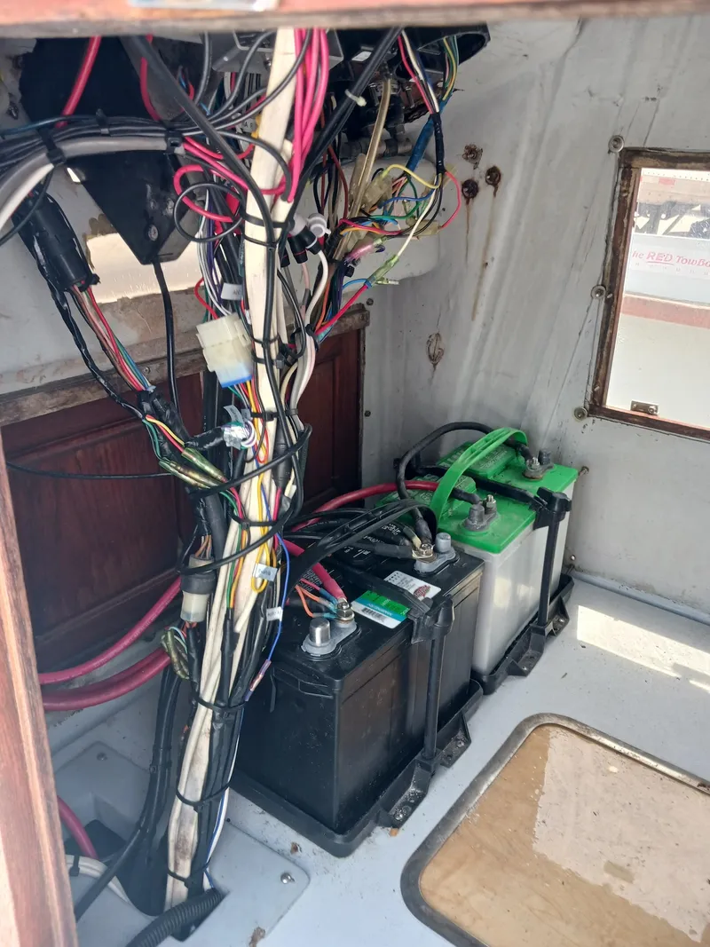 Slide: The Image of 1980 Hydra-Sports 2106 Vector boat interior wiring and battery setup. - 13