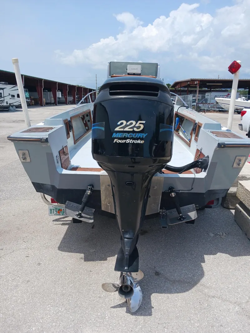 Slide: The Image of 1980 Hydra-Sports 2106 Vector boat with Mercury 225 FourStroke engine at marina. - 16