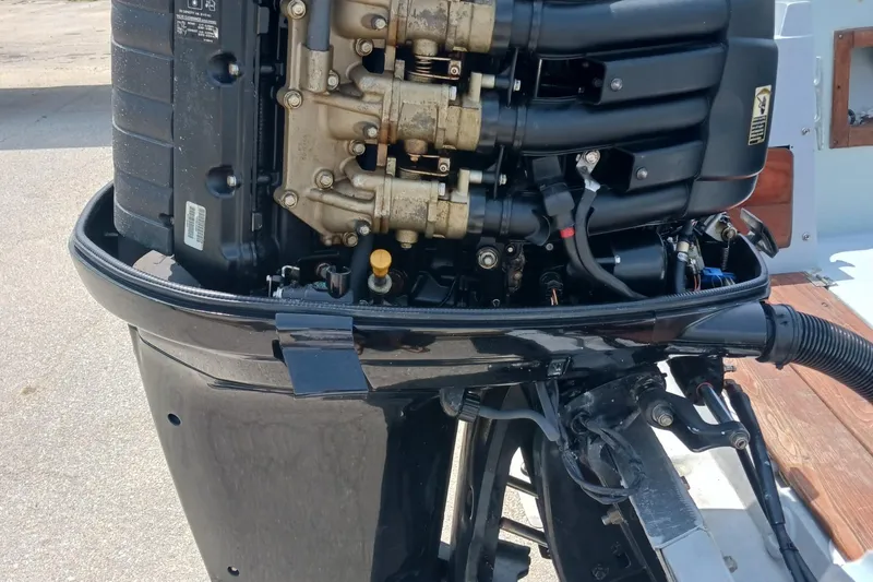 Slide: The Image of 1980 Hydra-Sports 2106 Vector outboard motor, detailed view of engine components. - 18