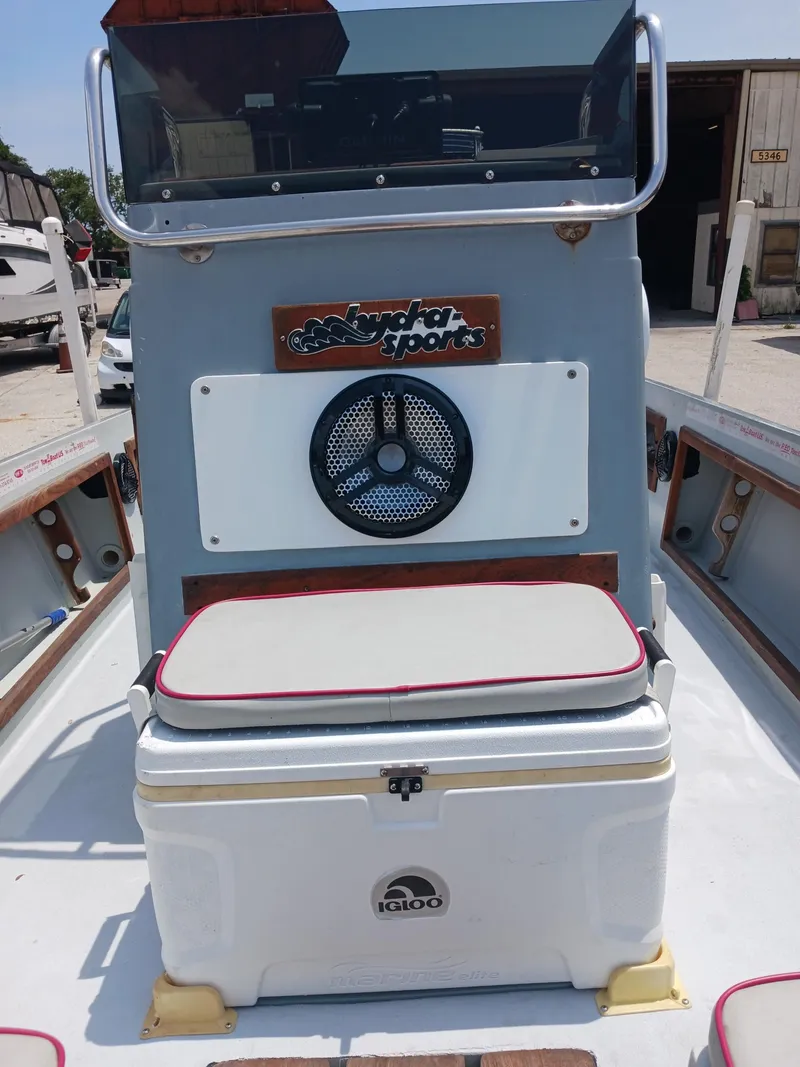 Slide: The Image of 1980 Hydra-Sports 2106 Vector boat interior with Igloo cooler and seating. - 2