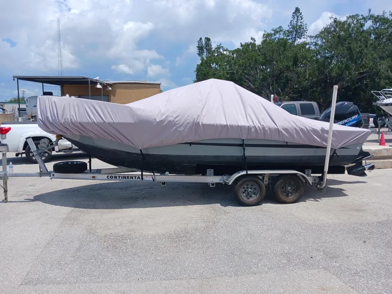 Slide: The Image of Covered 1980 Hydra-Sports 2106 Vector boat on trailer, parked outdoors. - 21