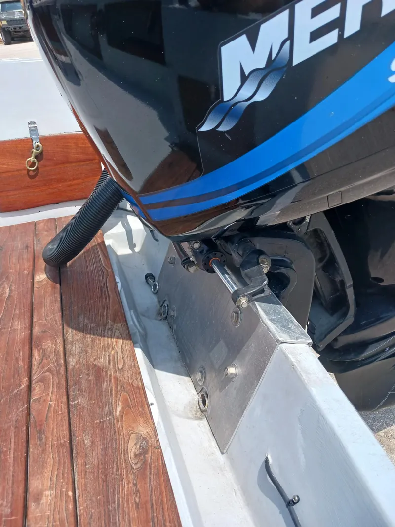 Slide: The Image of 1980 Hydra-Sports 2106 Vector boat with Mercury outboard motor, wooden deck detail. - 9