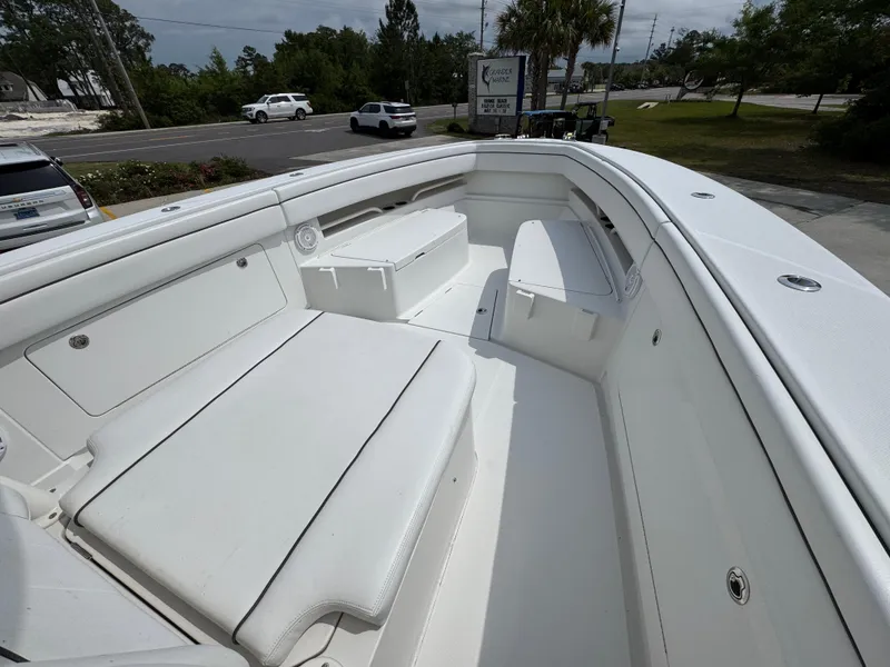 Slide: The Image of 2018 Jupiter 34 HFS boat with spacious white seating and sleek design. - 19