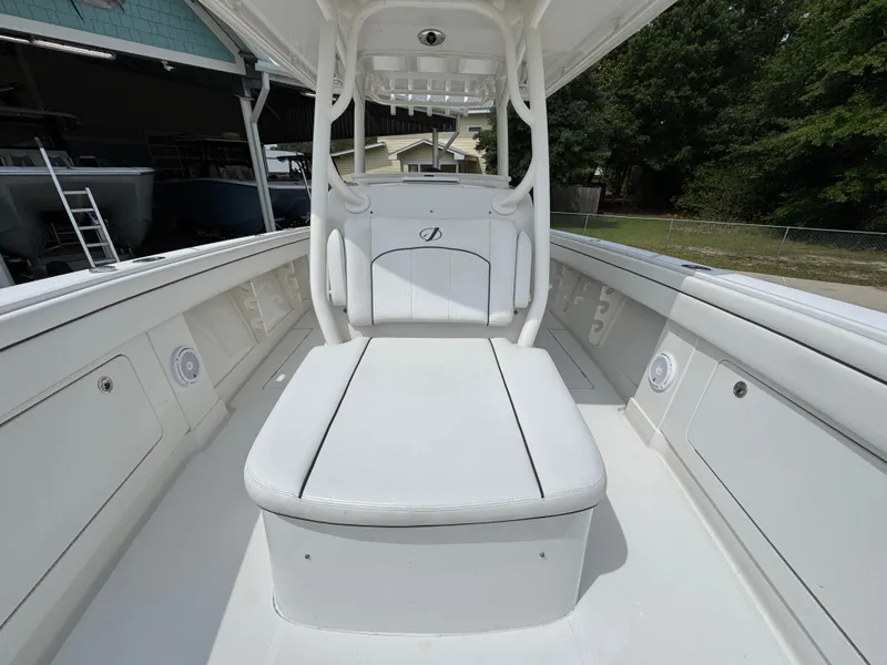 Slide: The Image of 2018 Jupiter 34 HFS boat interior with white seating and console. - 24