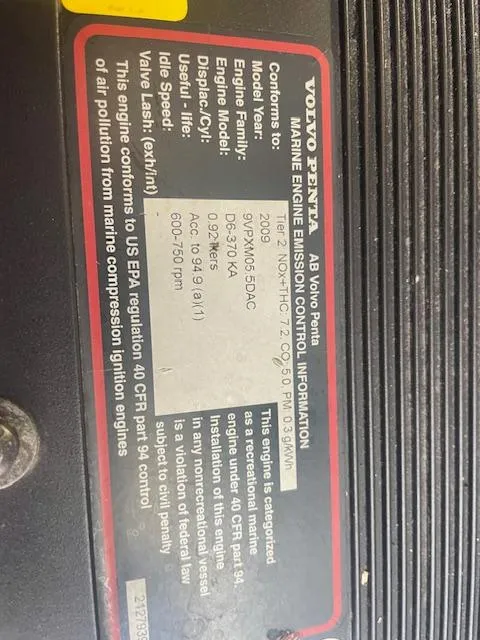 Slide: The Image of Label on a Volvo Penta marine engine, detailing emission control information. - 34