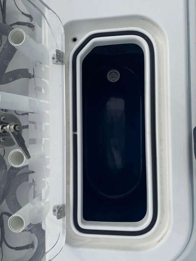 Slide: The Image of Livewell compartment on a 2019 Contender 35 ST boat. - 27
