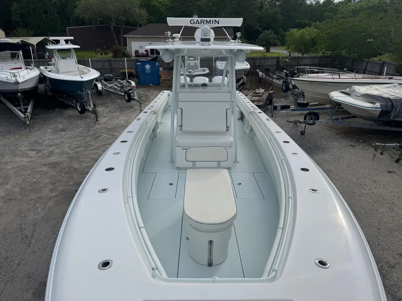 Slide: The Image of 2019 Contender 35 ST boat with Garmin equipment, docked in a marina. - 31