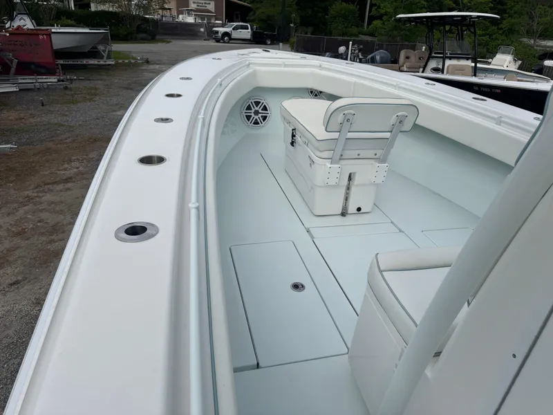 Slide: The Image of 2019 Contender 35 ST boat interior with seating and rod holders. - 38