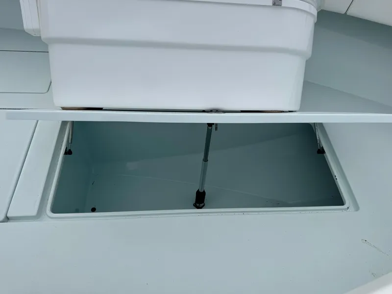Slide: The Image of Open storage compartment on 2019 Contender 35 ST boat. - 4