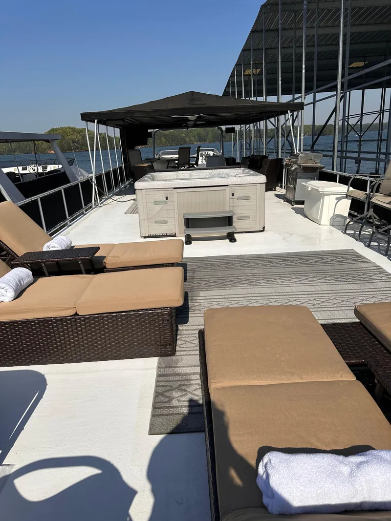 Slide: The Image of Luxury Starlite 18x85 yacht deck with sun loungers and canopy, 2008 model. - 16