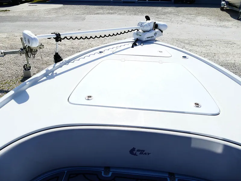 Slide: The Image of 2022 Contender 25 Bay boat with trolling motor on deck. - 19