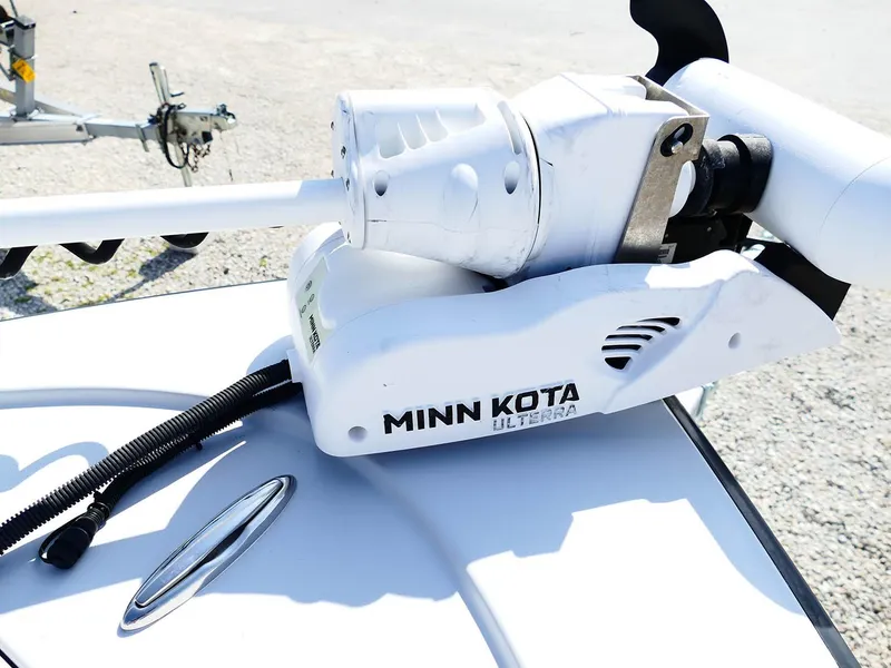 Slide: The Image of Minn Kota Ulterra motor on 2022 Contender 25 Bay boat, close-up view. - 23