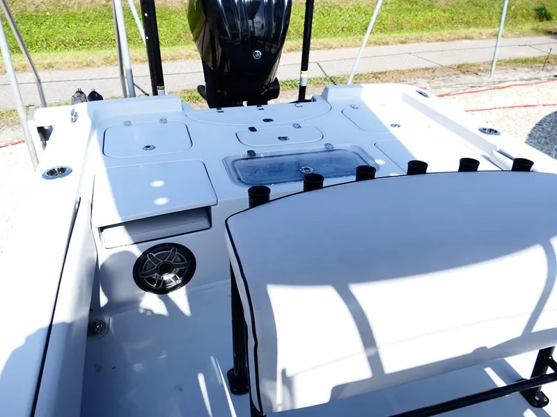 Slide: The Image of 2022 Contender 25 Bay boat interior with seating and storage compartments. - 35