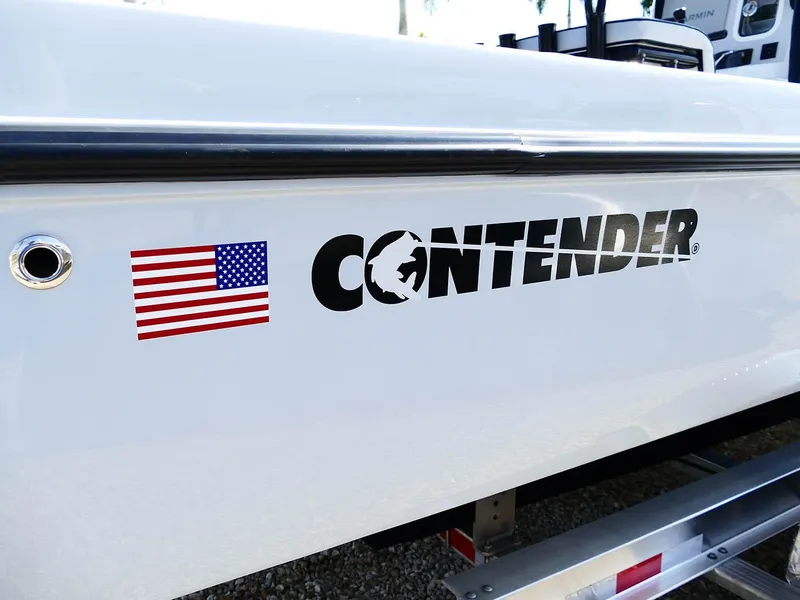 Slide: The Image of 2022 Contender 25 Bay boat with American flag decal on the side. - 4
