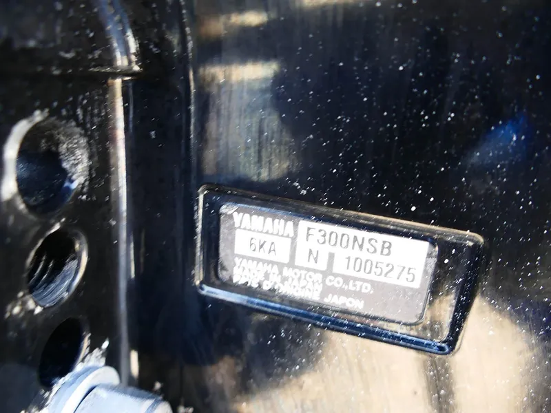 Slide: The Image of Yamaha F300NSB engine label on 2022 Contender 25 Bay boat. - 44