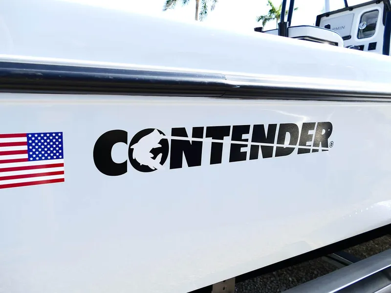 Slide: The Image of 2022 Contender 25 Bay boat with logo and American flag decal. - 45