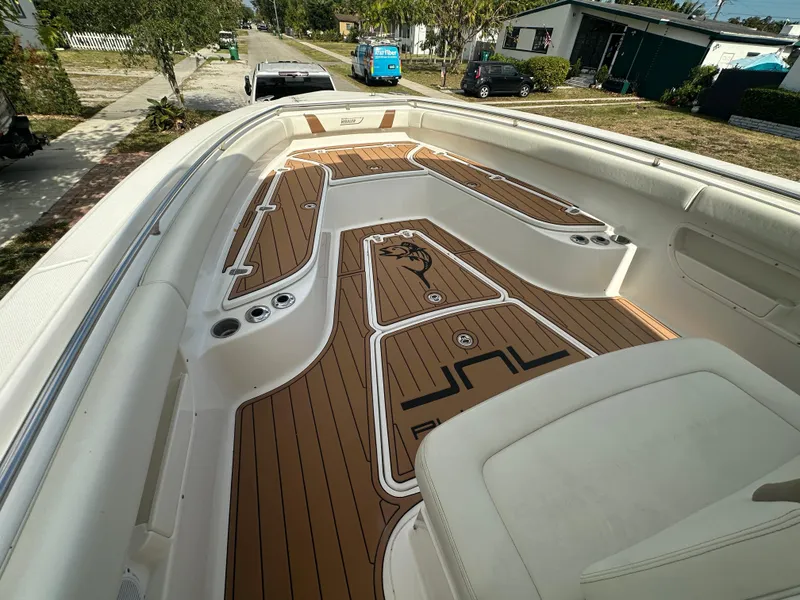 Slide: The Image of 2013 Boston Whaler 320 Outrage boat interior with custom deck design. - 20
