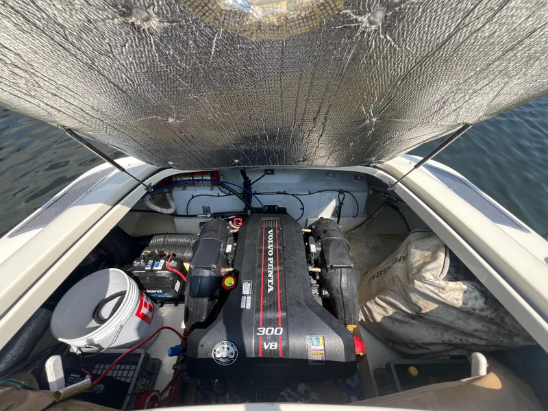 Slide: The Image of 2013 Chris-Craft Launch 22 engine compartment with Volvo Penta 300 V8 motor. - 15