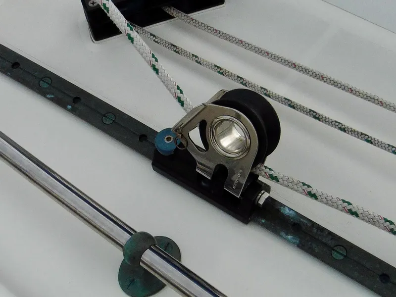 Slide: The Image of Cape George Cutter 2011 sailboat rigging detail with pulley and ropes. - 18