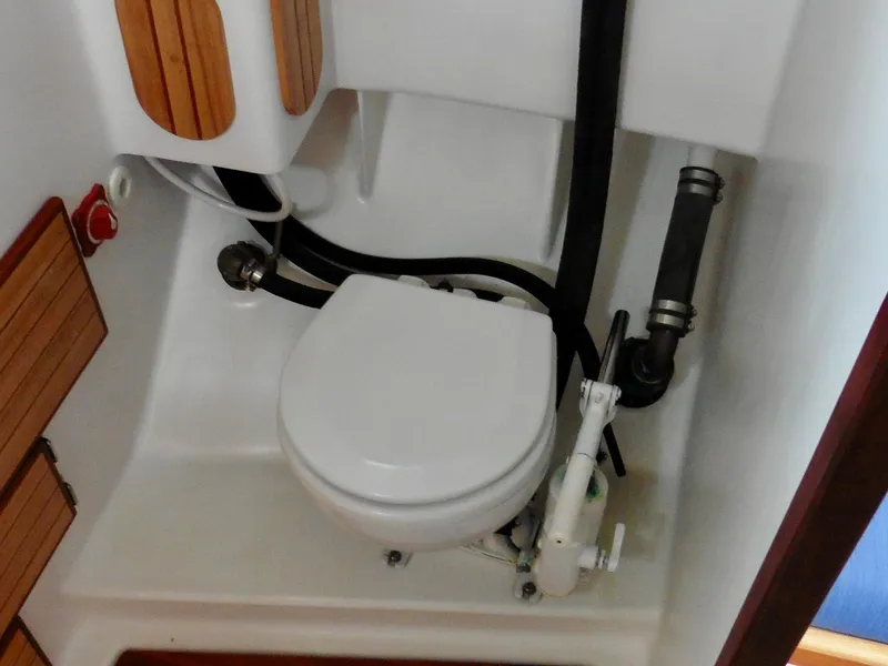 Slide: The Image of 2011 Cape George Cutter boat bathroom with compact marine toilet. - 42