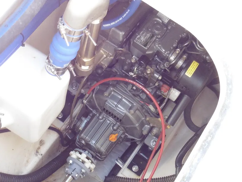 Slide: The Image of Engine compartment of a 2011 Cape George Cutter sailboat, showcasing mechanical components. - 8
