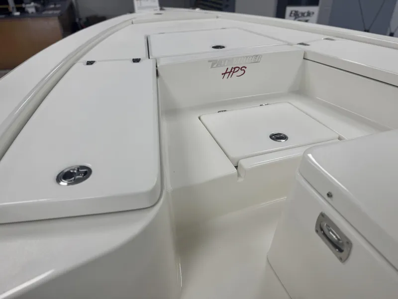 Slide: The Image of 2025 Pathfinder 2300 HPS boat deck with storage compartments and sleek design. - 6
