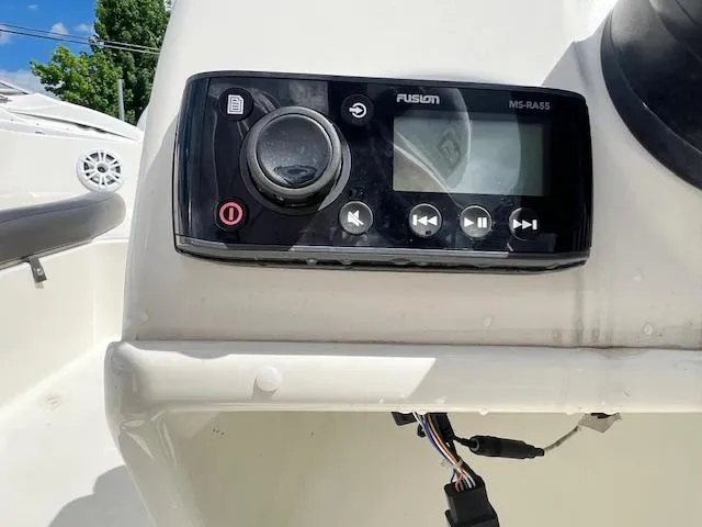 Slide: The Image of Fusion MS-RA55 stereo system on 2019 Stingray 182 SC boat dashboard. - 3