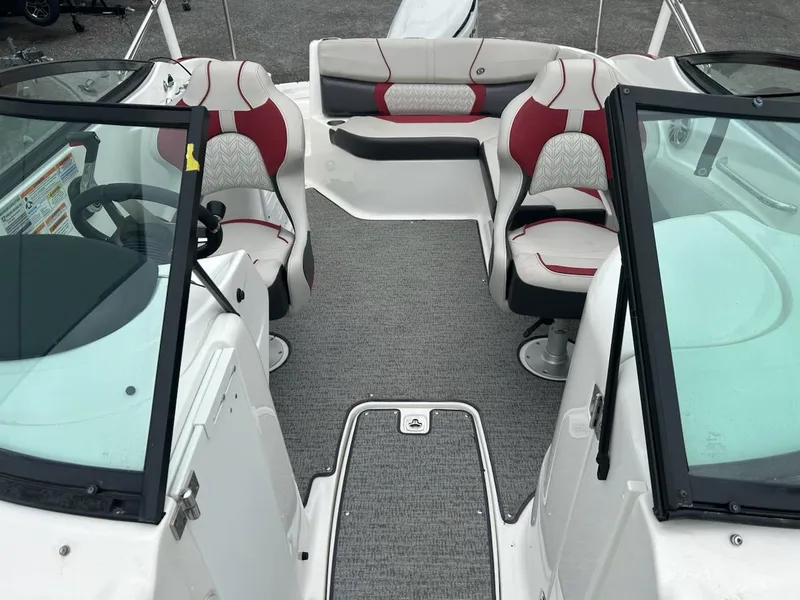 Slide: The Image of 2021 Hurricane SunDeck 2400 OB boat interior with red and white seating. - 4