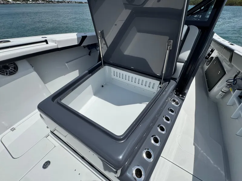 Slide: The Image of Open storage compartment on 2023 Yellowfin 42 boat, featuring sleek design and spacious interior. - 27