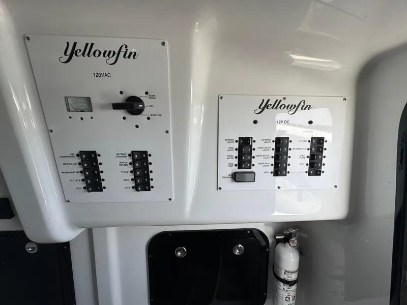 Slide: The Image of Electrical control panels on a 2023 Yellowfin 42 boat. - 35