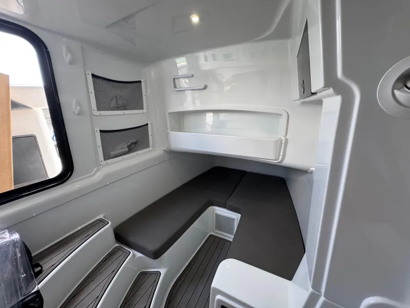 Slide: The Image of 2023 Yellowfin 42 interior cabin with sleek seating and modern design. - 36