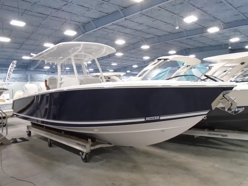 The Image of 2026 Jupiter 30 boat in showroom, featuring sleek design and modern amenities. - 11