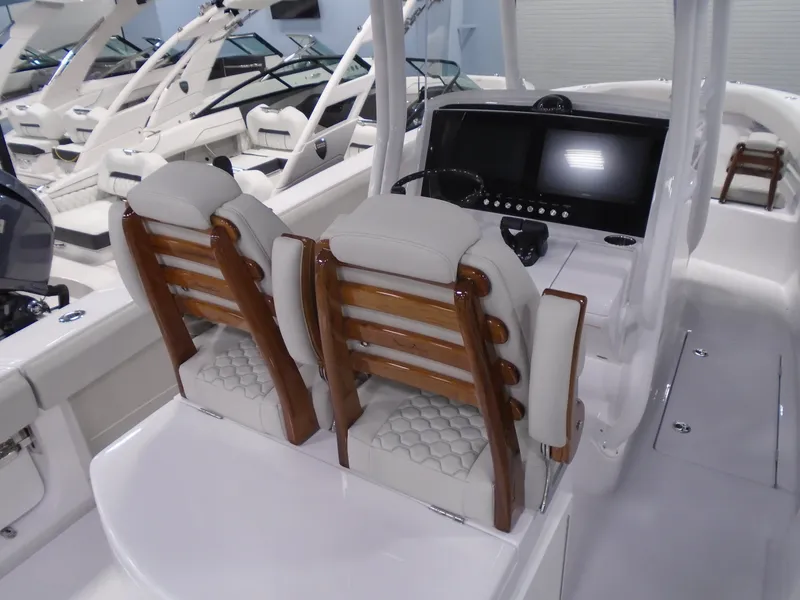 Slide: The Image of Luxury interior of 2026 Jupiter 30 boat with elegant seating and modern dashboard. - 21