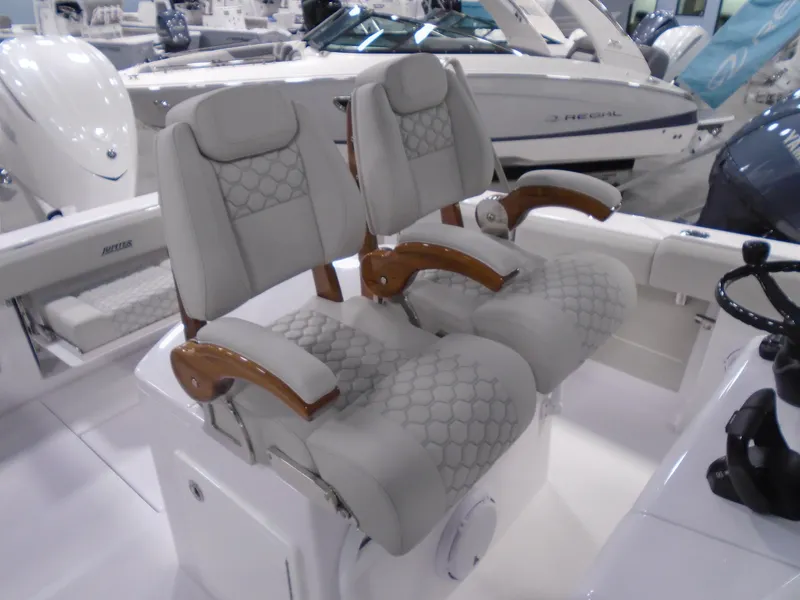 Slide: The Image of Luxury seating on 2026 Jupiter 30 boat, featuring elegant design and comfortable upholstery. - 22
