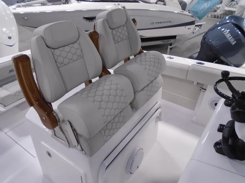 Slide: The Image of Luxury seating on a 2026 Jupiter 30 boat, featuring elegant design and premium materials. - 23
