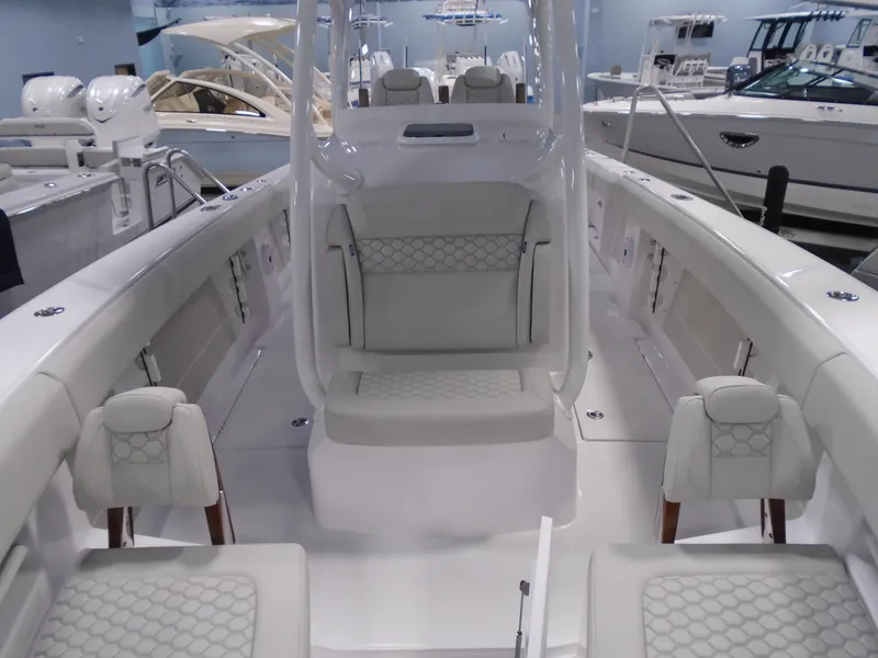 Slide: The Image of 2026 Jupiter 30 boat interior with white seating and modern design. - 31