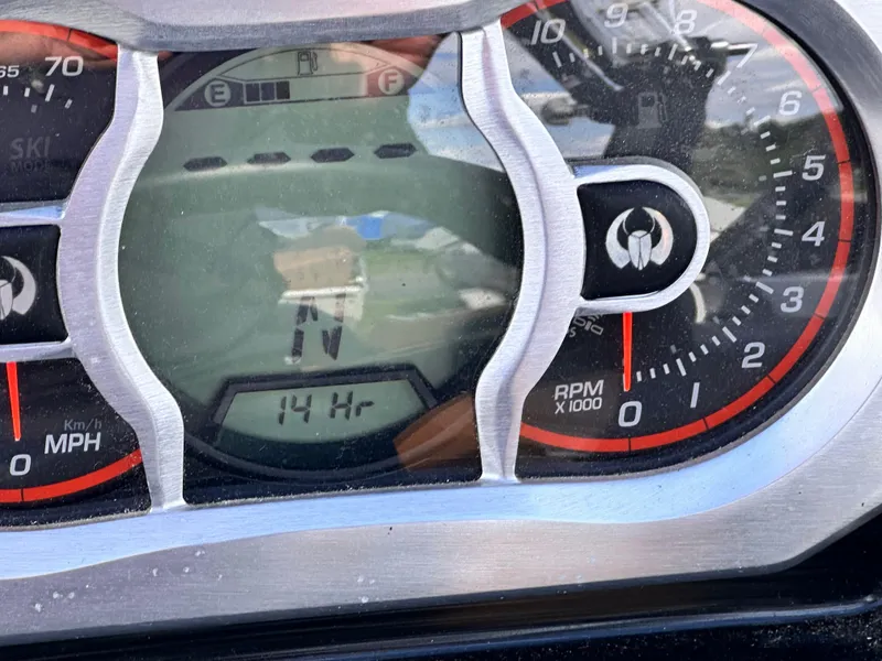Slide: The Image of Dashboard of a 2021 Scarab 195 Jet Boat showing 14 hours usage. - 6
