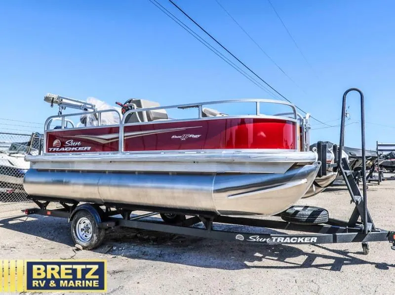 Slide: The Image of 2025 BASS BUGGY 16 XL Select pontoon boat on trailer at Bretz RV & Marine. - 5