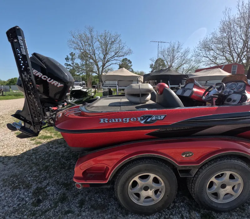 Slide: The Image of 2007 Ranger Z21 Comanche boat with Mercury engine on a trailer. - 7