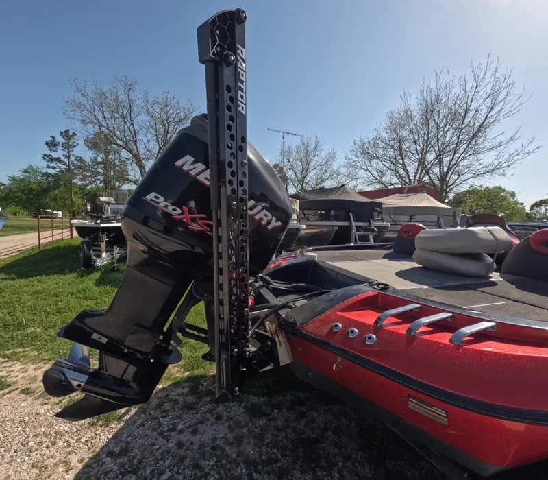 Slide: The Image of 2007 Ranger Z21 Comanche boat with Mercury Pro XS engine, parked outdoors. - 8