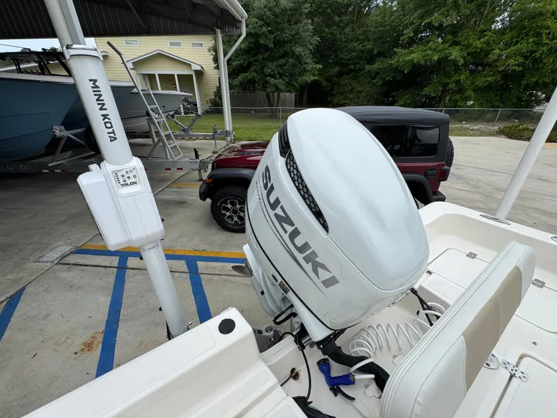 Slide: The Image of 2024 Bulls Bay 2400 boat with Suzuki outboard motor and Minn Kota trolling motor. - 38