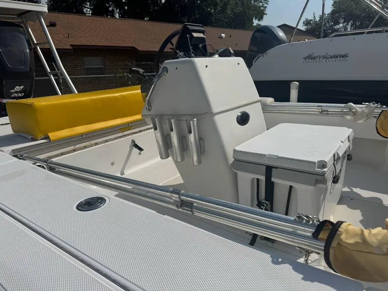 Slide: The Image of 2002 Ranger 191 Cayman boat interior with steering console and storage compartments. - 4