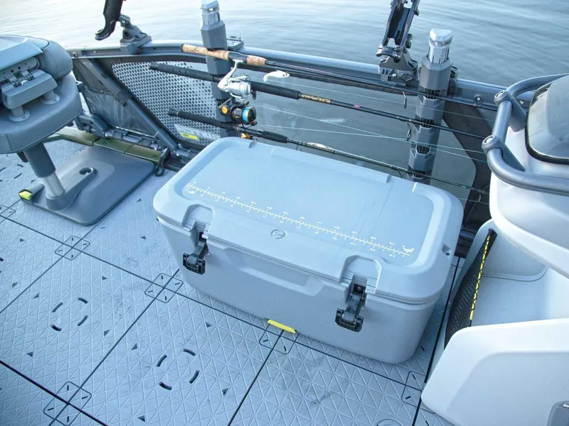 Slide: The Image of 2025 Sea-Doo Switch™ Fish 21 deck with fishing gear and storage box. - 5