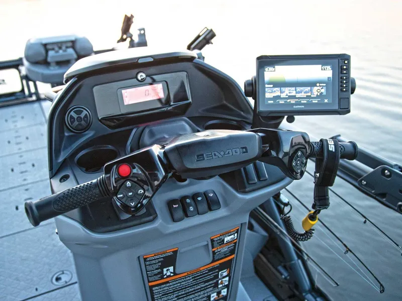 Slide: The Image of 2025 Sea-Doo Switch™ Fish 21 dashboard with advanced controls and navigation display. - 6
