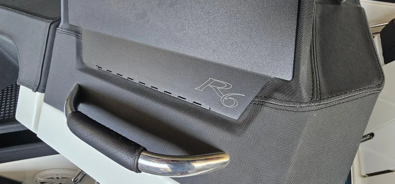 Slide: The Image of 2022 Cobalt R6 interior detail with sleek handle and textured finish. - 13
