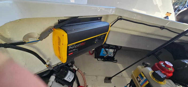 Slide: The Image of Battery charger installed in a 2022 Cobalt R6 boat engine compartment. - 37